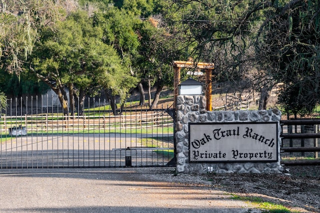 exterior space featuring a gate