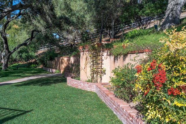 view of yard featuring fence