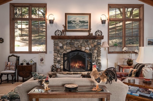 living room featuring a fireplace