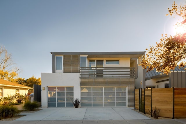 903 W Mission St, Santa Barbara, CA 93101 - contemporary home with stucco siding, driveway, a garage, and fence