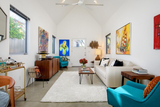 903 W Mission St, Santa Barbara, CA 93101 - living area with finished concrete flooring, high vaulted ceiling, and a ceiling fan