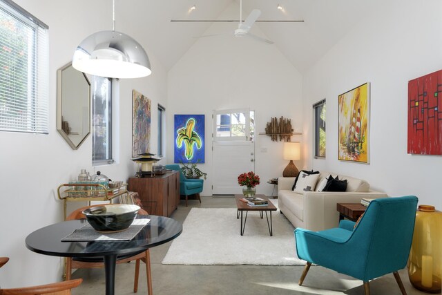 903 W Mission St, Santa Barbara, CA 93101 - living room featuring finished concrete flooring, high vaulted ceiling, and ceiling fan