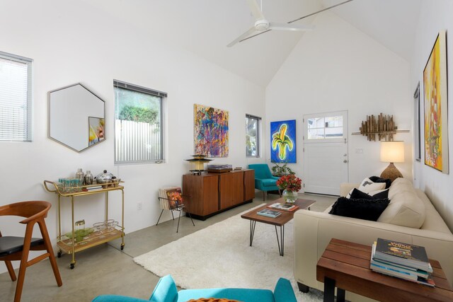 903 W Mission St, Santa Barbara, CA 93101 - living room featuring high vaulted ceiling, ceiling fan, and concrete flooring