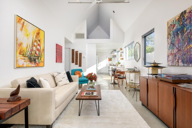 903 W Mission St, Santa Barbara, CA 93101 - living area featuring finished concrete flooring, visible vents, high vaulted ceiling, and ceiling fan