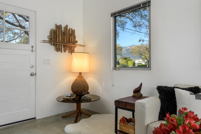903 W Mission St, Santa Barbara, CA 93101 - sitting room featuring finished concrete flooring and a wealth of natural light
