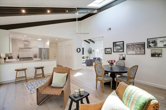 5134 Cathedral Oaks Rd, Santa Barbara, CA 93111 - living area featuring baseboards, beam ceiling, light wood-style floors, high vaulted ceiling, and a ceiling fan