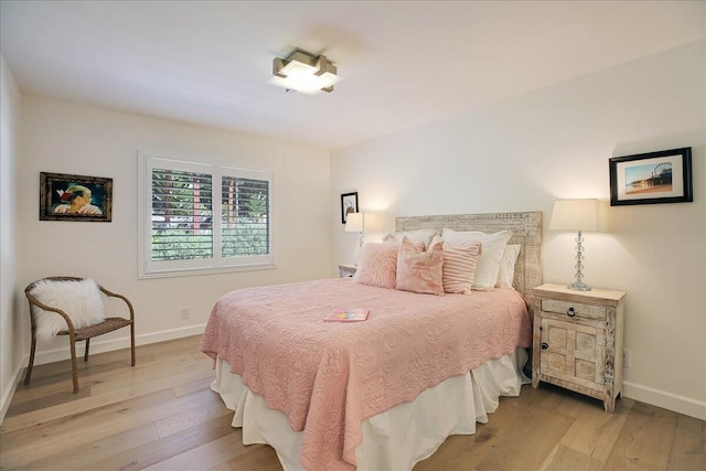 5134 Cathedral Oaks Rd, Santa Barbara, CA 93111 - bedroom with hardwood / wood-style flooring and baseboards