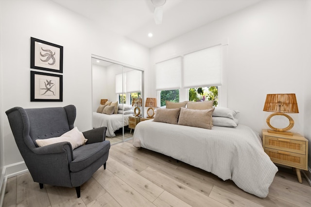 334 W Mission St, Santa Barbara, CA 93101 - bedroom featuring a closet, multiple windows, light wood-type flooring, recessed lighting, and a towering ceiling