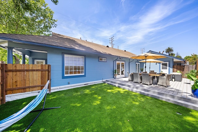 334 W Mission St, Santa Barbara, CA 93101 - back of property with a wooden deck, outdoor dining area, and a shingled roof