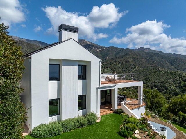 view of outdoor structure featuring a mountain view