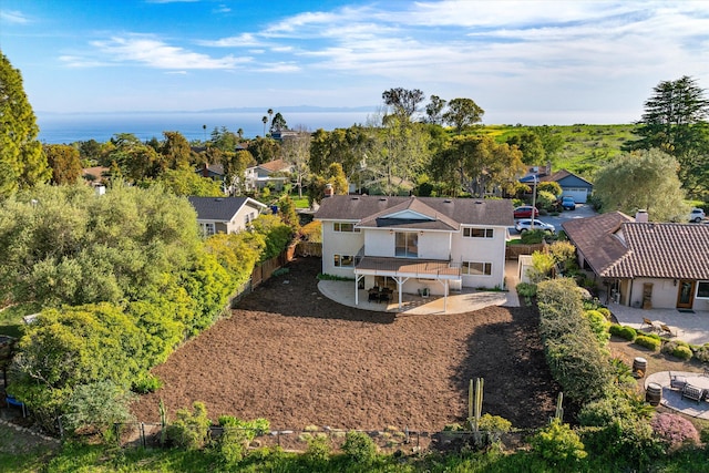 bird's eye view featuring a water view and a residential view