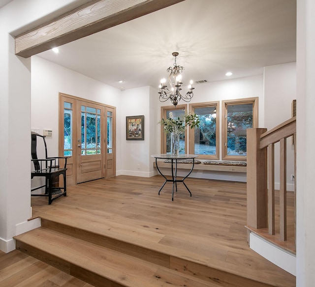 741 Saddle Ln, Ojai, CA 93023 - entryway with wood finished floors, recessed lighting, baseboards, stairway, and a chandelier