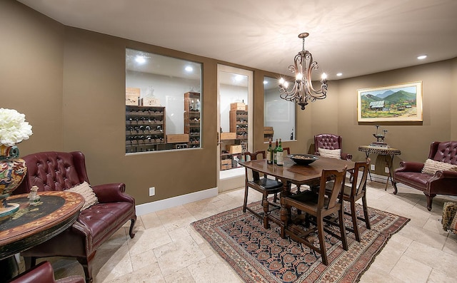 741 Saddle Ln, Ojai, CA 93023 - dining area with a chandelier, recessed lighting, stone tile flooring, and baseboards