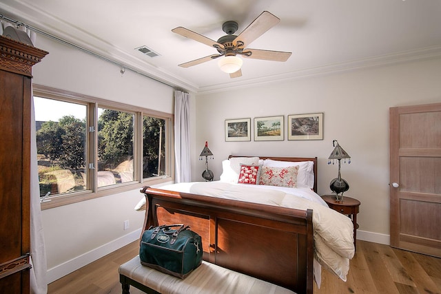 741 Saddle Ln, Ojai, CA 93023 - bedroom featuring ornamental molding, wood finished floors, baseboards, and ceiling fan