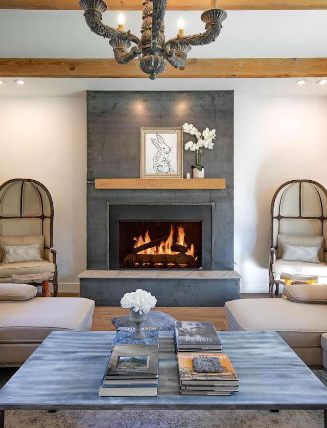 741 Saddle Ln, Ojai, CA 93023 - living area with a large fireplace, a chandelier, and recessed lighting