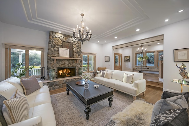 741 Saddle Ln, Ojai, CA 93023 - living area with a chandelier, a tray ceiling, wood finished floors, plenty of natural light, and recessed lighting