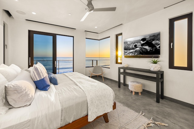 bedroom with baseboards, finished concrete flooring, ceiling fan, and access to exterior