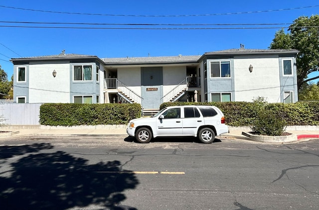 view of building exterior with stairs