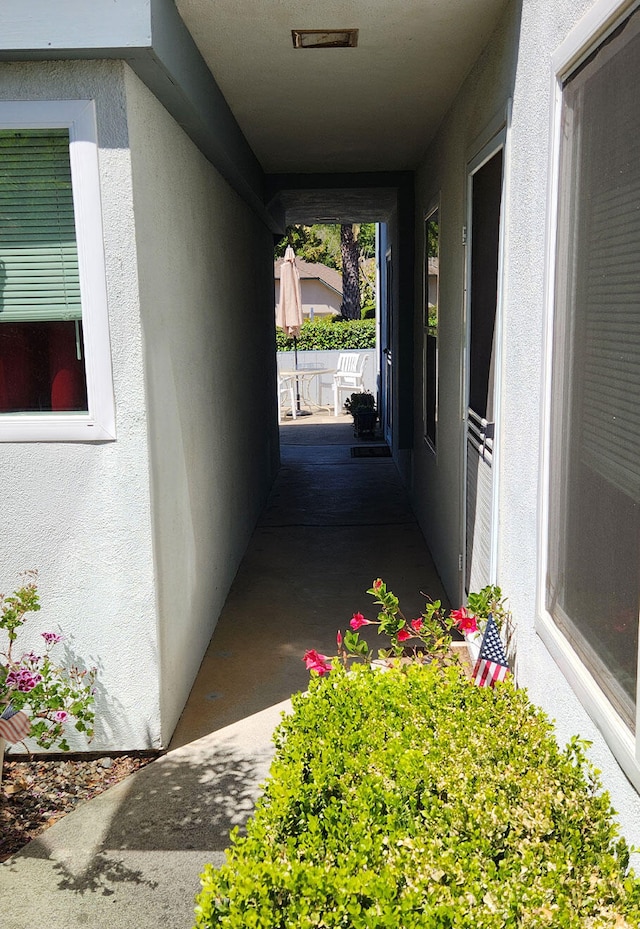 exterior space featuring stucco siding