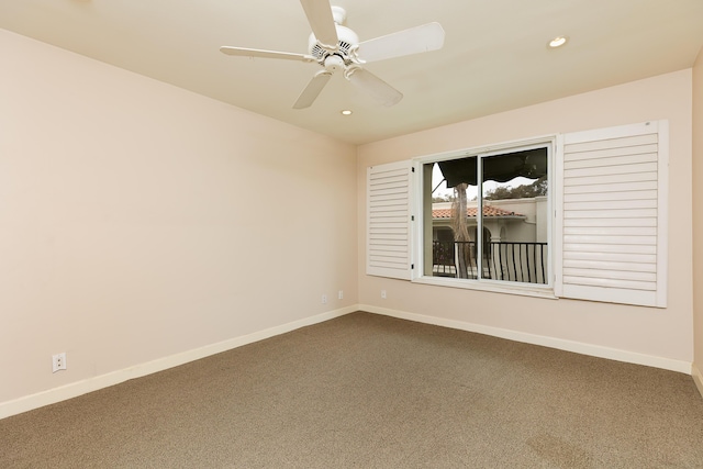 spare room with dark colored carpet, ceiling fan, recessed lighting, and baseboards