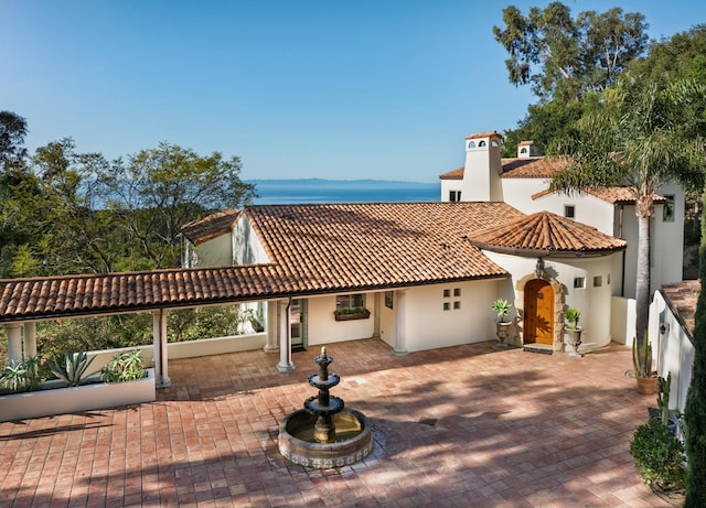 1060 Ladera Ln, Santa Barbara, CA 93108 - mediterranean / spanish home with a patio, stucco siding, and a tile roof