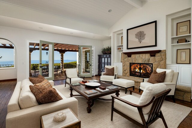 1060 Ladera Ln, Santa Barbara, CA 93108 - living area with wood finished floors, a fireplace, lofted ceiling with beams, and built in features