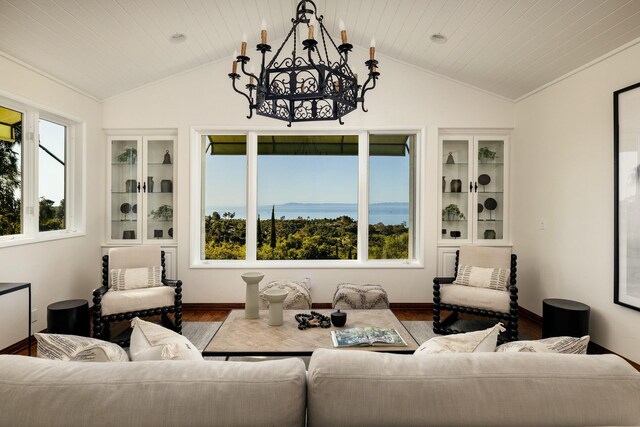 1060 Ladera Ln, Santa Barbara, CA 93108 - living room with wood ceiling, wood finished floors, a notable chandelier, and lofted ceiling