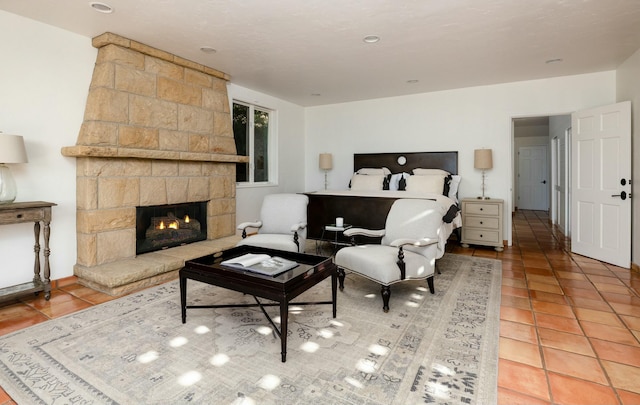 1060 Ladera Ln, Santa Barbara, CA 93108 - living area with a stone fireplace and light tile patterned flooring