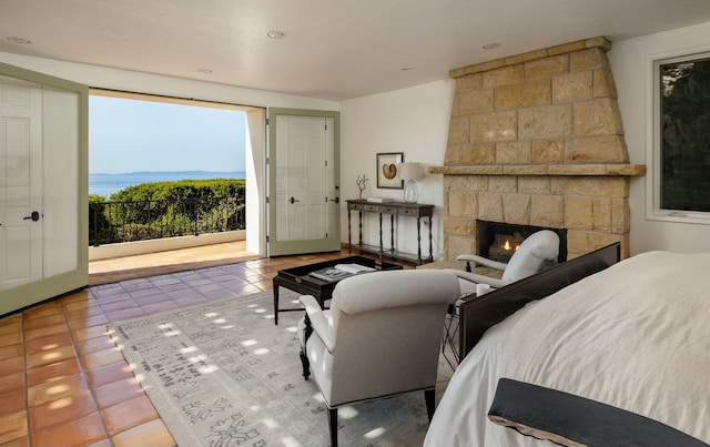 1060 Ladera Ln, Santa Barbara, CA 93108 - tiled bedroom featuring access to exterior and a fireplace