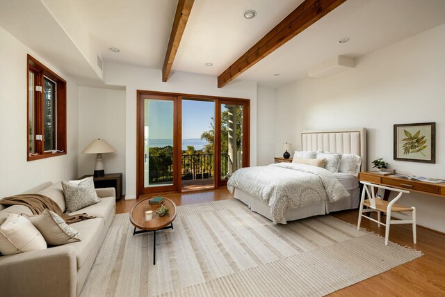 1060 Ladera Ln, Santa Barbara, CA 93108 - bedroom featuring access to exterior, wood finished floors, beam ceiling, and recessed lighting
