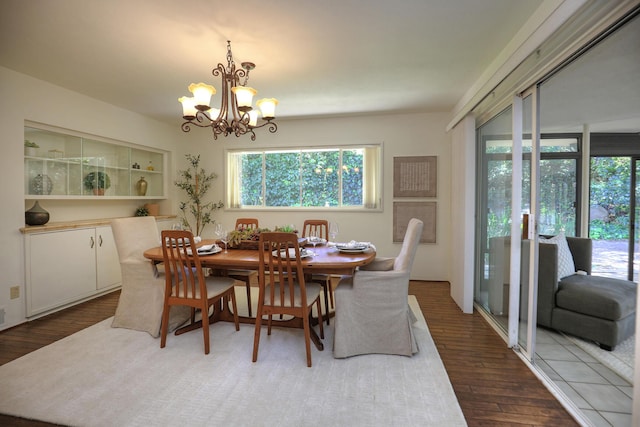 840 Mission Canyon Rd, Santa Barbara, CA 93105 - dining space featuring a chandelier, wood finished floors, and a wealth of natural light