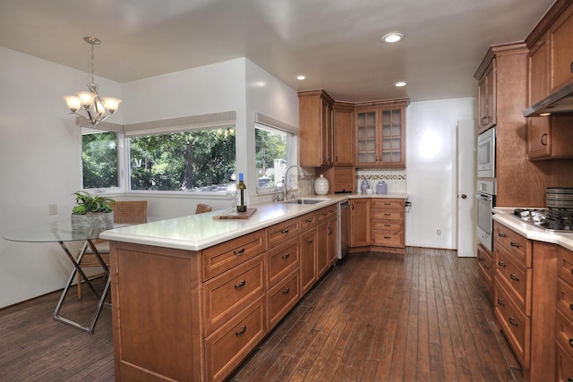 840 Mission Canyon Rd, Santa Barbara, CA 93105 - kitchen with brown cabinets, backsplash, a sink, and stainless steel appliances