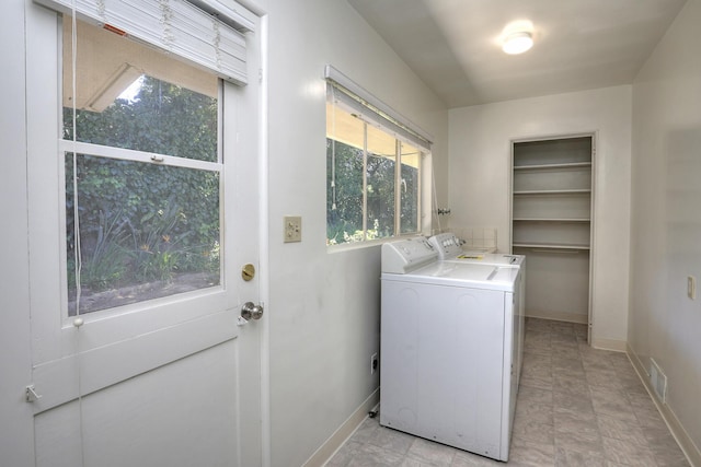 840 Mission Canyon Rd, Santa Barbara, CA 93105 - laundry area with a wealth of natural light, washing machine and dryer, laundry area, and baseboards