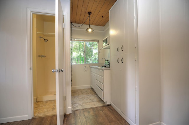 840 Mission Canyon Rd, Santa Barbara, CA 93105 - hall with a sink, light wood-type flooring, and wood ceiling