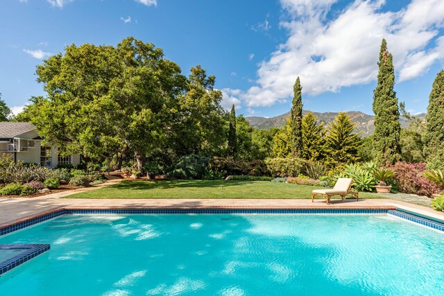 935 Arcady Rd, Santa Barbara, CA 93108 - view of pool featuring a yard, a mountain view, and a pool with connected hot tub