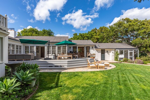 935 Arcady Rd, Santa Barbara, CA 93108 - rear view of house featuring a yard, roof with shingles, outdoor lounge area, and a chimney