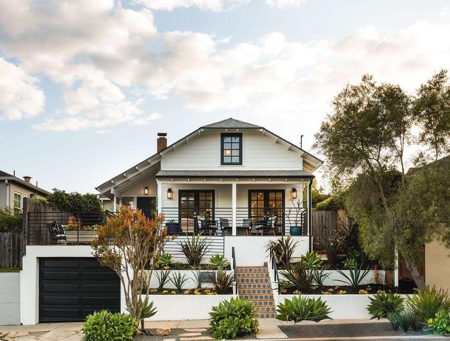 1109 Olive St, Santa Barbara, CA 93101 - bungalow with a chimney, fence, covered porch, and stairs