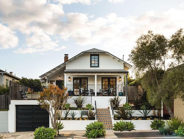 1109 Olive St, Santa Barbara, CA 93101 - bungalow with a chimney, fence, covered porch, and stairs