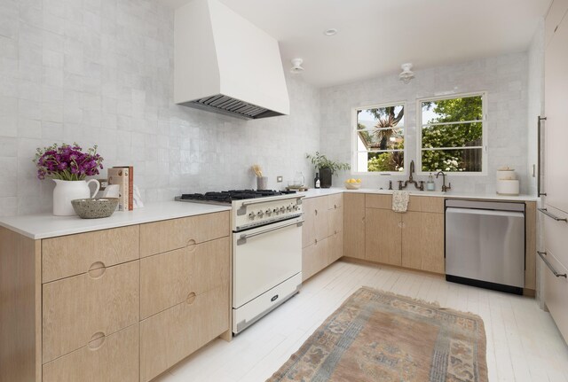 925 Chelham Way, Santa Barbara, CA 93108 - kitchen featuring dishwasher, custom range hood, white gas range oven, light brown cabinetry, and light wood-type flooring