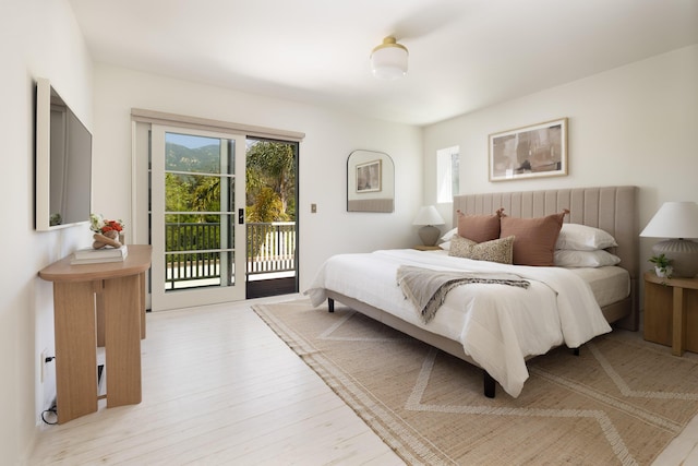925 Chelham Way, Santa Barbara, CA 93108 - bedroom with access to exterior and light wood-style floors