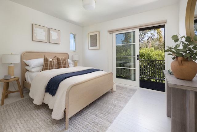 925 Chelham Way, Santa Barbara, CA 93108 - bedroom featuring access to outside, multiple windows, and wood finished floors