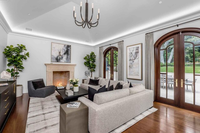 2084 E Valley Rd, Montecito, CA 93108 - living area featuring an inviting chandelier, french doors, visible vents, and crown molding