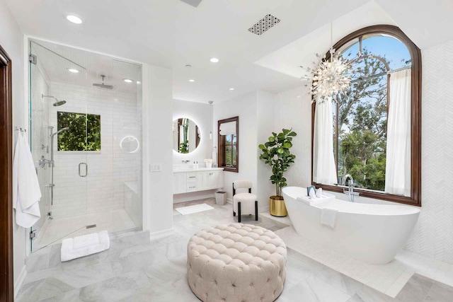 2084 E Valley Rd, Montecito, CA 93108 - bathroom with a wealth of natural light, a shower stall, vanity, and recessed lighting
