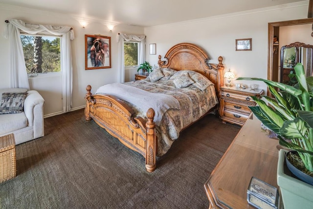 bedroom with baseboards and ornamental molding