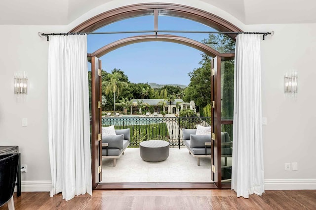 2084 E Valley Rd Unit 1, Santa Barbara, CA 93108 - doorway to outside with baseboards and wood finished floors