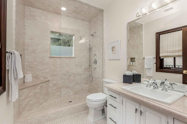 2084 E Valley Rd Unit 1, Santa Barbara, CA 93108 - bathroom featuring tile patterned floors, tiled shower, vanity, and toilet
