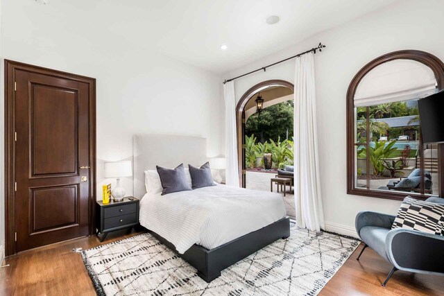 2084 E Valley Rd Unit 1, Santa Barbara, CA 93108 - bedroom featuring light wood-style flooring, access to exterior, and baseboards