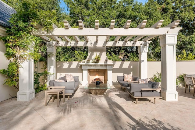 2084 E Valley Rd Unit 1, Santa Barbara, CA 93108 - view of patio with a pergola and an outdoor living space with a fireplace