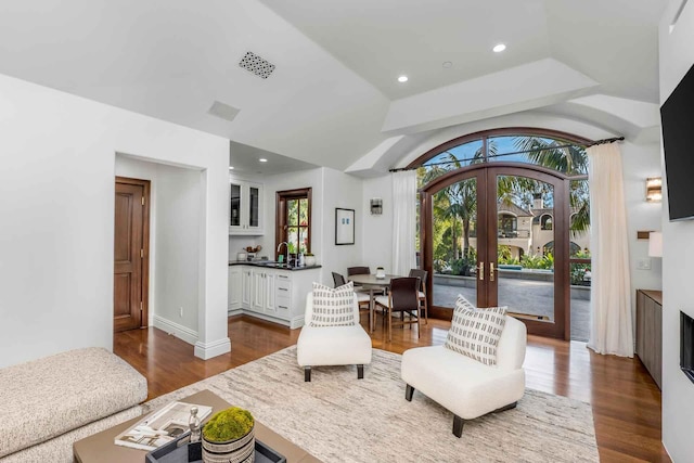 2084 E Valley Rd Unit 1, Santa Barbara, CA 93108 - living area with french doors, dark wood finished floors, and recessed lighting