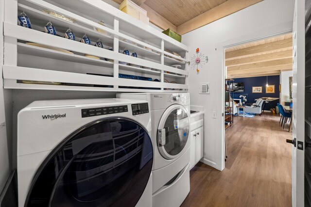 1435 Sycamore Canyon Rd, Santa Barbara, CA 93108 - washroom featuring washer and dryer, cabinet space, wood ceiling, and wood finished floors